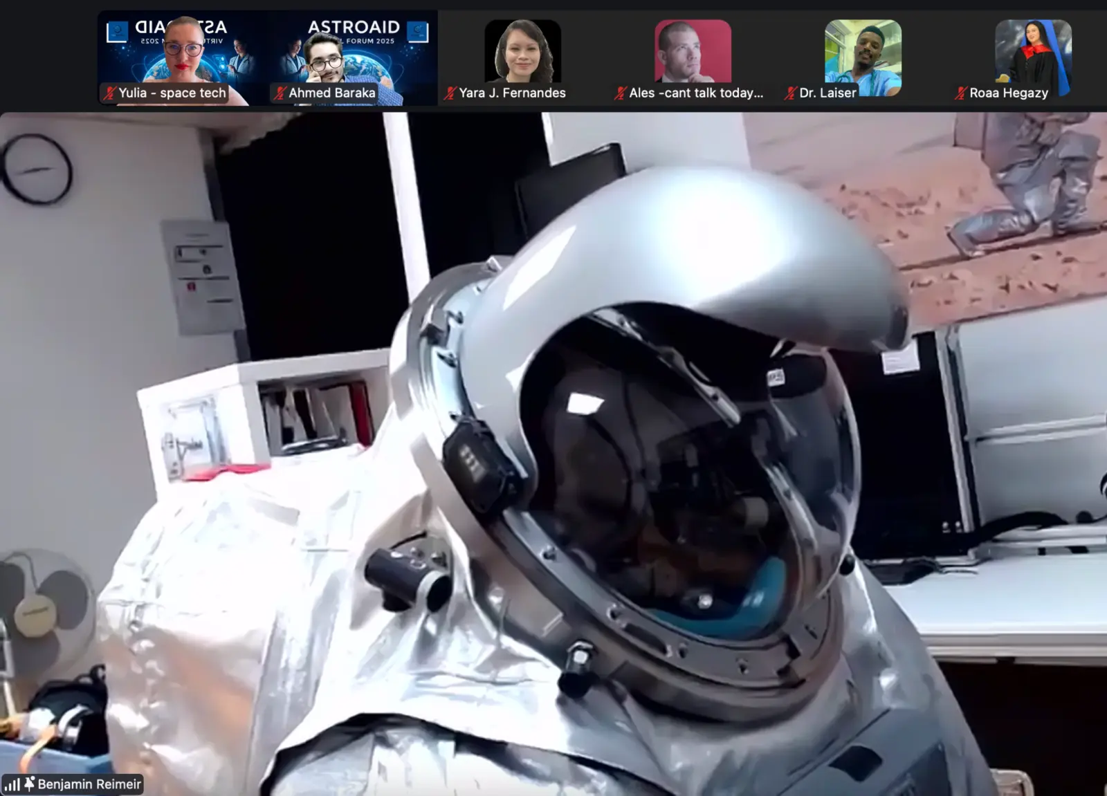 A close-up of an analogue spacesuit during a live forum demonstration